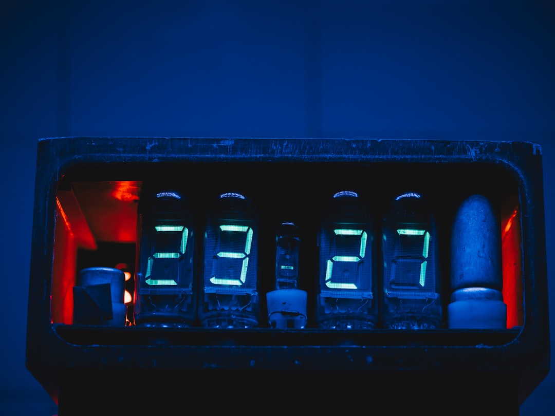 The clock shows 23:27 on a digital display.