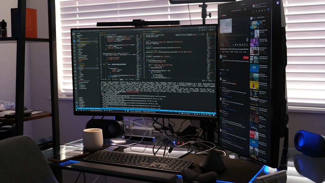 a computer monitor sitting on top of a desk
